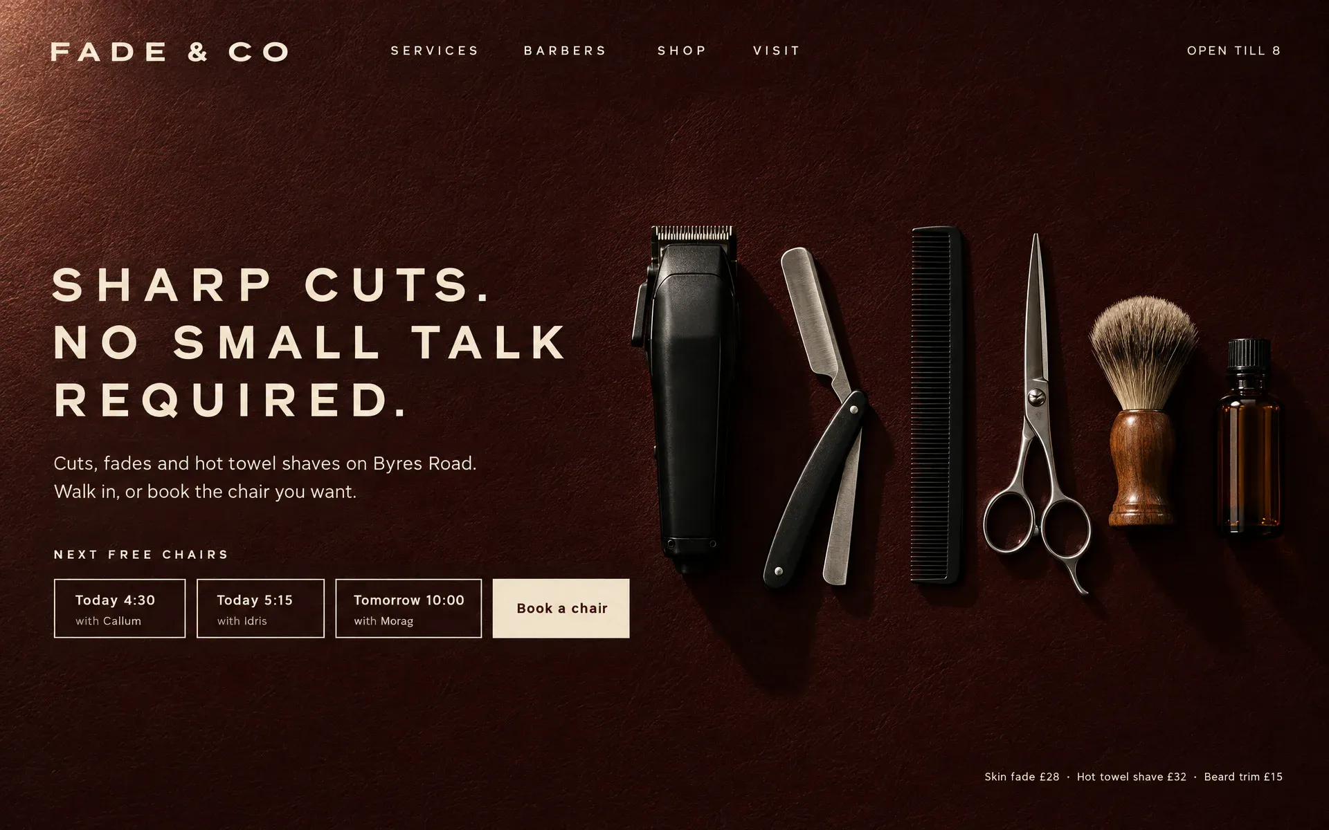 A barber shop site on oxblood leather: clippers, razor, comb, scissors and brush laid in a precise row, with three bookable chair times