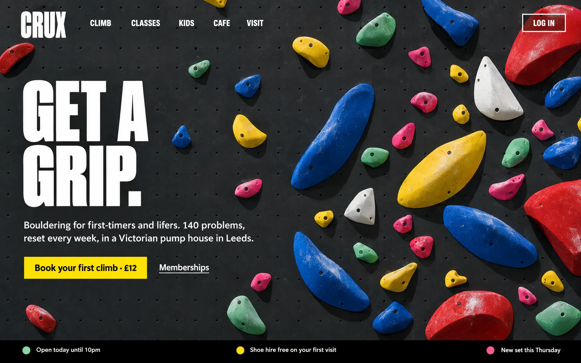 A climbing gym site: a charcoal wall of red, blue, yellow, mint and pink holds shot straight on, with GET A GRIP in heavy white capitals